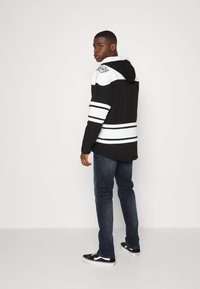 Tommy Jeans RYAN REGULAR STRAIGHT - Calças de ganga de perna direita - denim dark