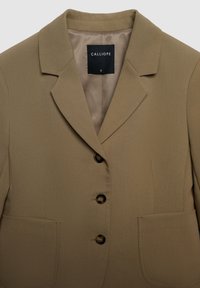 Blazer marrone con colletto a rever, design a monopetto, due tasche frontali e tre bottoni neri. Etichetta: CALLIOPE, taglia S.