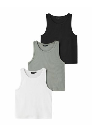 Trois débardeurs côtelés sans manches en noir, gris et blanc, disposés en chevauchement sur un fond blanc.