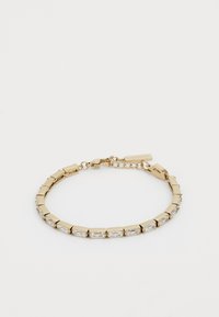 Gold bracelet with rectangular links and clear rectangular stones. Features a clasp and small extendable chain with a tag.