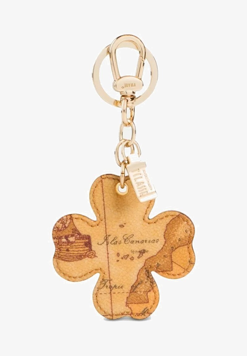 Portachiavi in pelle a forma di fiore con design di mappa vintage, hardware in tono dorato e tag attaccato. Superficie texturizzata con bordi cuciti.