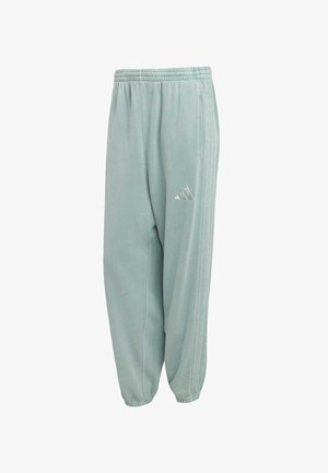 Pantaloni jogger verde chiaro realizzati in tessuto morbido, dotati di vita elasticizzata, tasche laterali e un piccolo logo in rilievo sulla coscia.