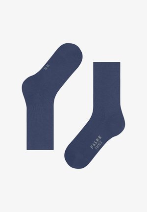 Marineblaue Baumwollsocken mit gerippten Bündchen, nahtloser Zehenkonstruktion und einem hellgrauen Logo "FALKE FAMILY" nahe der Zehenpartie.