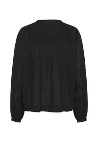 Schwarze Bluse mit langen Ärmeln, texturierten vertikalen Streifen und kleinem Punktmuster, gerafftem Schulterbereich und geknöpften Manschetten, von hinten gezeigt.