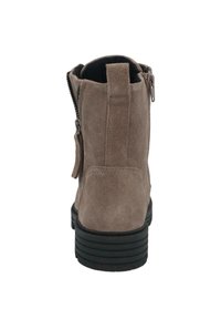 Brown suede ankle boot with black sole, visible zipper on side, and pull tab at the back.