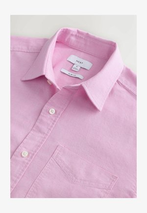 Slim-Fit rosa Hemd mit Button-Down-Kragen, ausgestattet mit einer Brusttasche und weißen Knöpfen. Hergestellt aus einem strukturierten Stoff. Etiketten im Kragen.