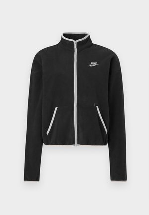 Čierna fleecová bunda s vysokým golierom, plným zipsom, bielymi akcentmi a bočnými vreckami. Na ľavej hrudi sa nachádza malé logo Nike.