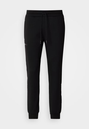 Antony Morato TROUSERS METAL EFFECT RUBBER LOGO - Tracksuit bottoms - black