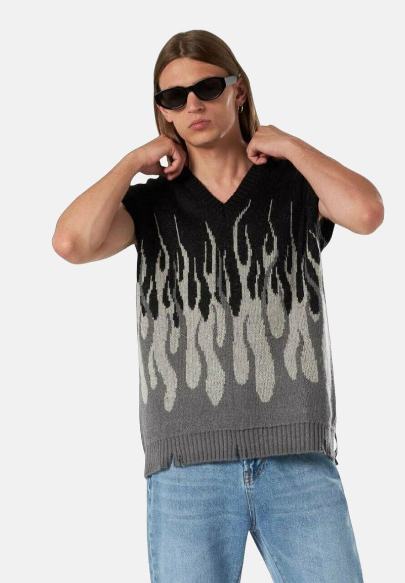 Maglione senza maniche grigio a maglia caratterizzato da un motivo a fiamma in nero e crema. Scollo a V, orlo a coste e vestibilità rilassata.