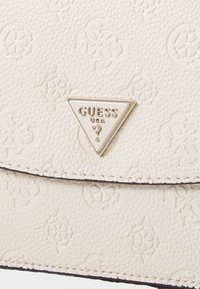 Guess CRESIDIA XBODY FLAP - Cross body bag - bone