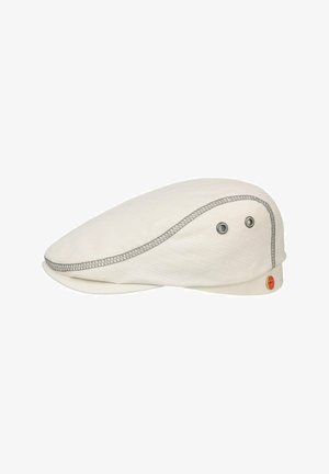 White flat cap with gray stitching, two metal ventilation eyelets on the side, and a small round orange logo tag near the back.