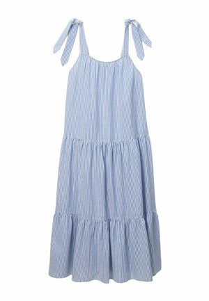 Robe sans manches rayée verticalement bleu et blanc avec jupe à volants et bretelles nouées.