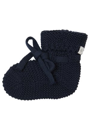 Gestrickter navyfarbener Stiefel mit weichem Material, Bindungsdetails und umgeschlagenem Kn cuff. Runde Form mit flacher Sohle für Säuglinge.