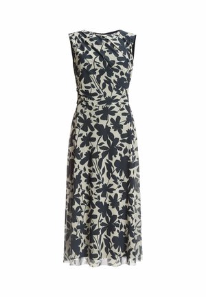 Abito senza maniche con un motivo floreale bianco e nero, con un corpino aderente, tessuto drappeggiato e gonna fluida.
