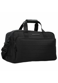 Sac de sport noir en tissu durable ; doté de deux poignées, d'une sangle réglable et d'une poche zippée à l'avant.