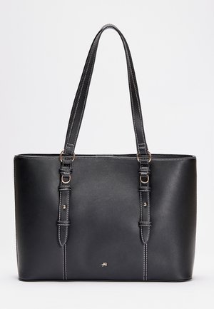 Bolsa tote sintética negra con dos asas largas, textura suave, detalles de costura blanca y un pequeño logo cerca de la base.