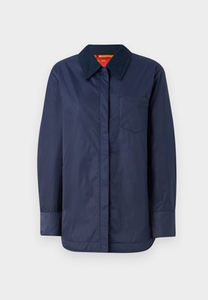 Navy blue long-sleeve jacket with a pointed collar, front pocket, and smooth texture. Features a contrasting inner lining in red and yellow.
