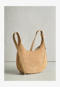 Sélectionné, tan brown