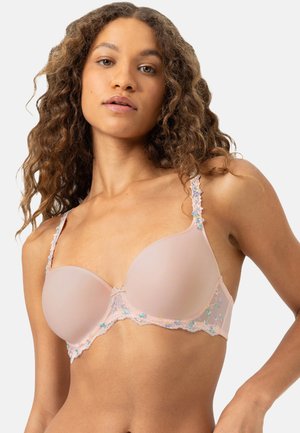 Soutien-gorge rembourré rose clair avec bordure en dentelle florale, bretelles réglables et tissu doux. Caractéristiques une surface lisse et des détails de couture décoratifs.