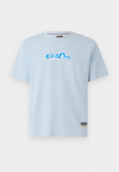 Light blue cotton t-shirt with short sleeves, featuring a graphic "EVISU did everything" logo in blue and white on the front.