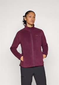 Giacca in pile bordeaux con collo alto, zip completa e due tasche laterali. Caratterizzata da una texture liscia e una silhouette aderente.