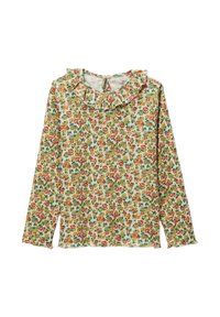 Blouse crème à manches longues avec un petit motif floral rouge, jaune et vert et un col volanté.