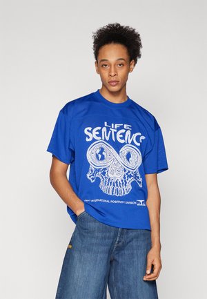 Blue mesh T-shirt featuring a graphic print with “LIFE SENTENCE” and skull motif, round neck, short sleeves, and relaxed fit.