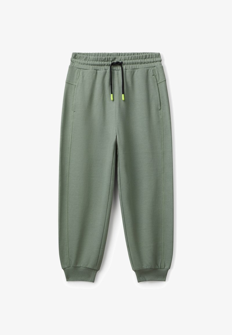 Helle grüne Jogginghosen mit elastischem Bund, schwarzem Kordelzug mit neonfarbenen Enden, seitlichen Taschen und gerippten Bündchen.