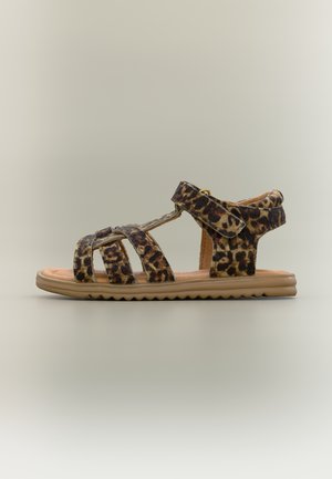 Børnesandal med åbne tæer, leopardprintede remme og tanfarvet polstret sål, med velcro-lukning ved anklen.