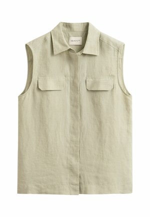 Mouwloos beige linnen overhemd met kraag en twee borstzakken met klep, knoopsluiting aan de voorkant verborgen achter een beleg.