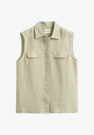 Mouwloos beige linnen overhemd met kraag en twee borstzakken met klep, knoopsluiting aan de voorkant verborgen achter een beleg.