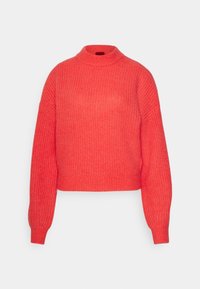 Pull corail vif en tricot avec un col montant, une texture côtelée, des manches longues et une coupe courte. Présente des poignets et un ourlet épais.