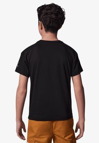 Jordan PATCH TEE - T-shirts - black