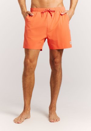 Orangene Badeshorts mit elastischem Bund und Kordelzug, ausgestattet mit Seitentaschen und einem kleinen Markenzeichen am unteren Saum.