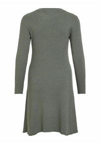 Robe à manches longues en jersey côtelé de couleur verte douce. Elle présente un col rond simple et des fentes sur les côtés à l'ourlet pour plus de liberté de mouvement.
