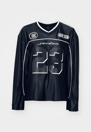 Maglia nera a maniche lunghe con accenti bianchi, con il numero "23" in evidenza sul davanti, realizzata in un materiale morbido e leggero.