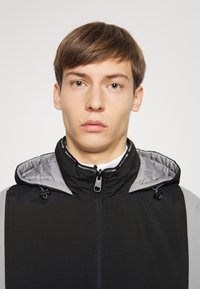 DC Shoes TRANSITION REVERSIBLE ANORAK - Casaco de snowboard - black