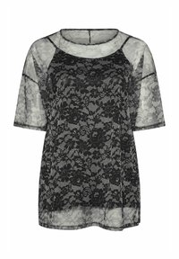 Blusa nera in pizzo con motivo floreale, maniche corte, scollo rotondo e tessuto trasparente con vestibilità ampia. I bordi sono rifiniti con un sottile trim.