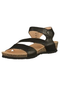 Sandale en cuir noir avec une semelle intermédiaire en liège, plusieurs brides réglables, un design à bout ouvert et une semelle extérieure en caoutchouc plate.