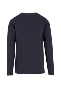 Maglietta a maniche lunghe di un blu navy scuro, realizzata in cotone texturizzato, con un semplice colletto rotondo e aperture laterali all'orlo per facilitare i movimenti.