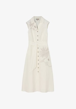Abito senza maniche color crema con scollatura a colletto, chiusura frontale con bottoni e ricami laterali che presentano design floreali e astratti. Include una cintura in vita.