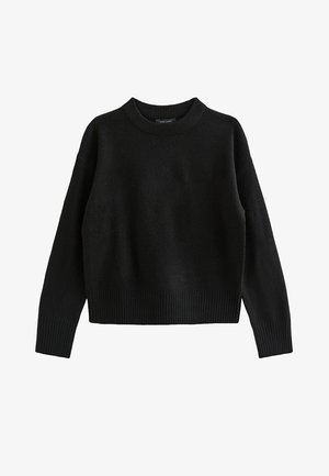 Pull en tricot noir avec un col rond, des épaules tombantes, des poignets et un ourlet côtelés. Texture douce avec un design court. Simple et sans ornement.