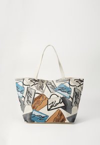 Canvas tote bag with a wide shape, featuring a repeating pattern of designer bags in blue, brown, gray, and black, with light handles.