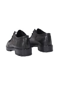 Scarpe nere in pelle con una texture liscia, forma arrotondata e una suola in gomma robusta dotata di un motivo antiscivolo. Lacci nella parte anteriore.