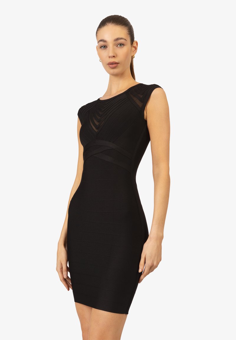 Zwarte bodycon jurk met korte mouwen, gestructureerde ribstof, geaccentueerde taille detail en een soepele, aansluitende silhouet.
