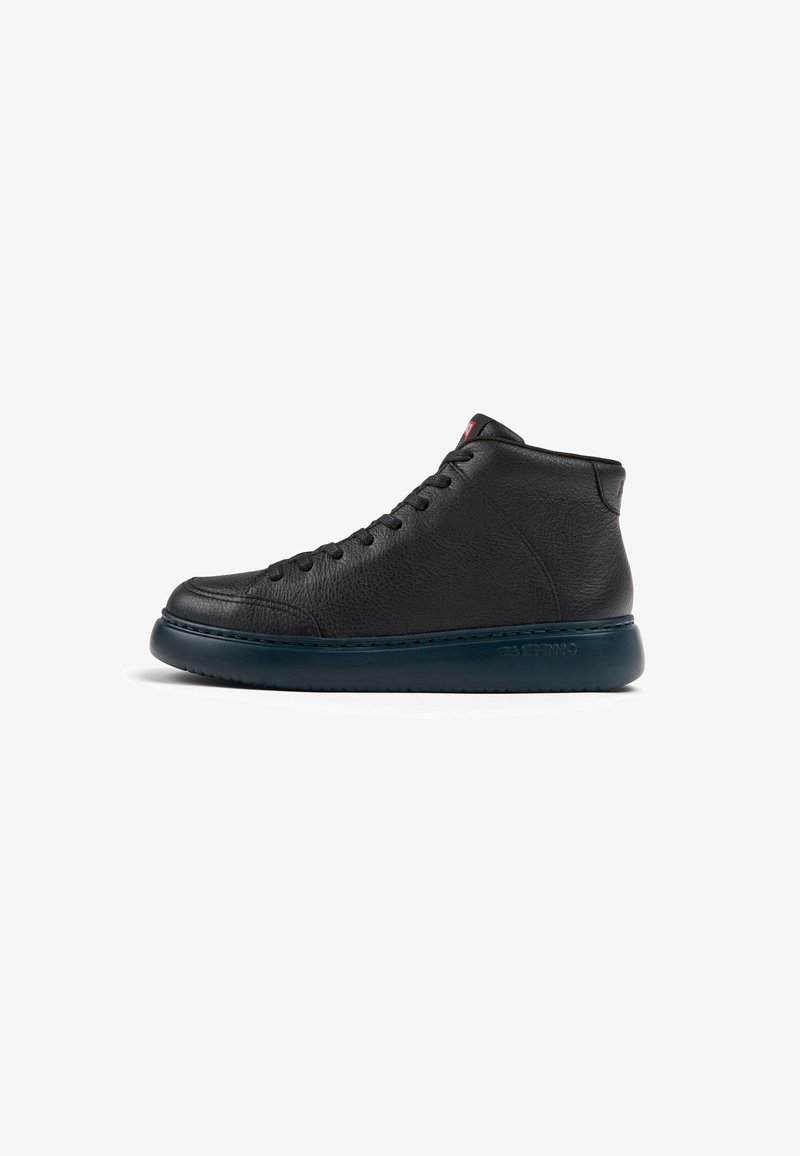 Black leather high-top sneaker with round toe, textured upper, tonal stitching, and a contrasting dark blue rubber sole.