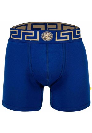 Blaue Baumwoll-Boxershorts mit einem schmalen, goldfarbenen, gemusterten Bund, der ein griechisches Schlüsselmotiv und ein Logo-Medaillon in der Mitte aufweist.