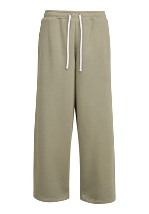 Világos olajzöld, puha pamut keverékből készült melegítőnadrág, mely rugalmas derékkal és fehér zsinórral, valamint széles lábakkal rendelkezik.