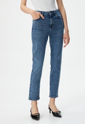 Hoge taille blauwe denim jeans met een rechte pijp, voorzien van twee voorzakken en een lichte slijtage bij de knieën.