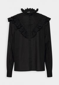 Blusa nera a maniche lunghe con yoke e colletto arricciati, caratterizzata da un intricato ricamo nero. Tessuto morbido, vestibilità aderente con chiusura a bottoni.